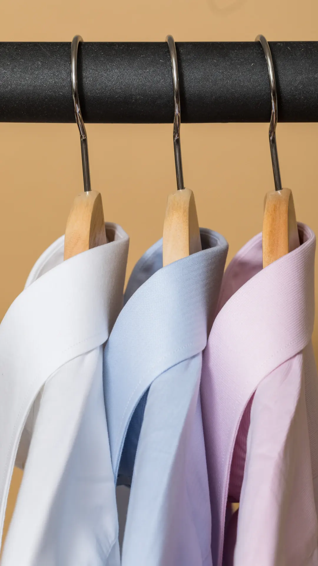 white and purple clothes hangers